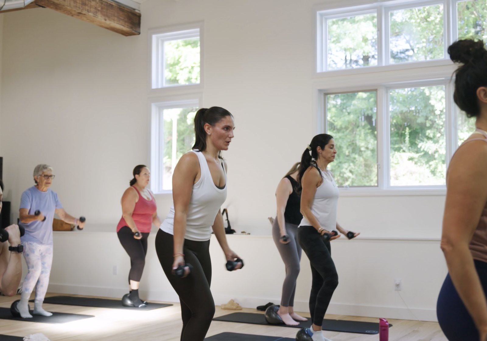 A group class on the mats in the studio